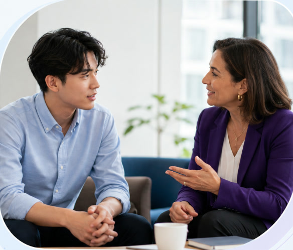 A mentee and mentor in conversation together