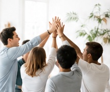 Teammates celebrating with a high five